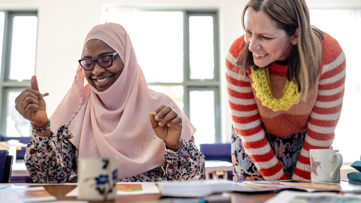 Helping an artists in a workshop